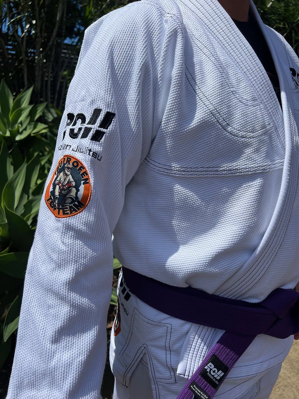 Ibuprofen Top Team gi, close view of the chest patch and belt